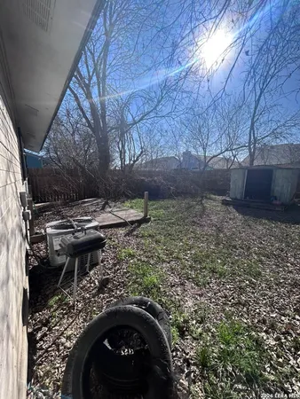 a backyard of a house with lots of green space