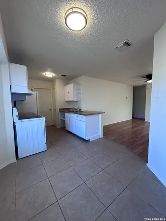 a view of kitchen and a sink