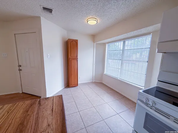 an empty room with closet