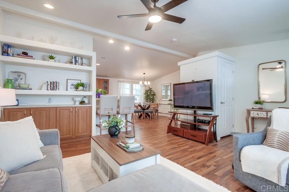 120 Brookside Lane Oceanside, CA 92056 - Photo 11 of 55 a living room with furniture and a flat screen tv