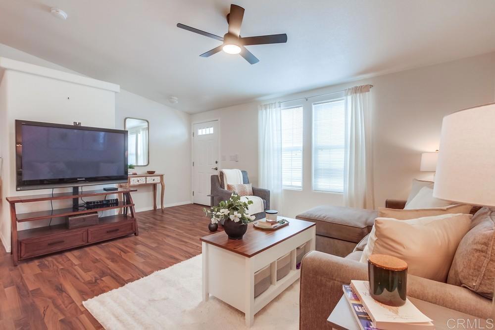 120 Brookside Lane Oceanside, CA 92056 - Photo 2 of 55 a living room with furniture and a flat screen tv