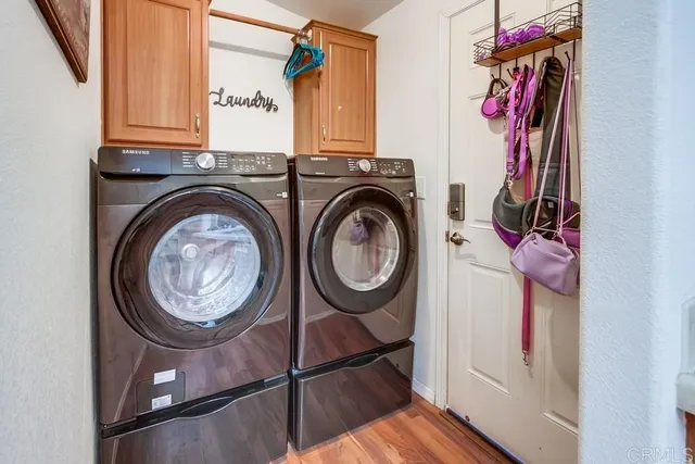 a bedroom with a bed and a cabinets