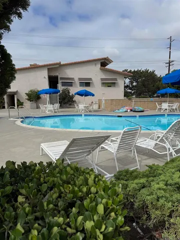 a front view of a house with a garage