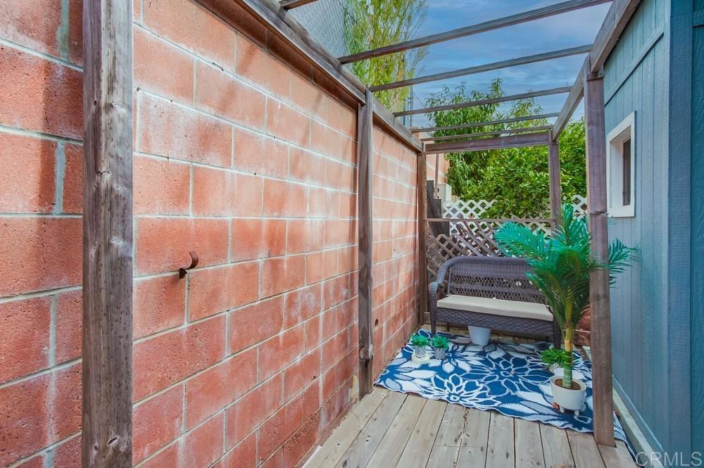 120 Brookside Lane Oceanside, CA 92056 - Photo 50 of 55 a view of a porch with wooden floor