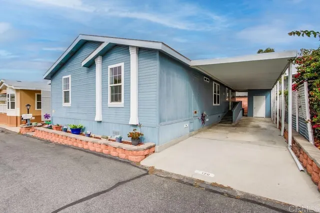 a front view of a house with a garage