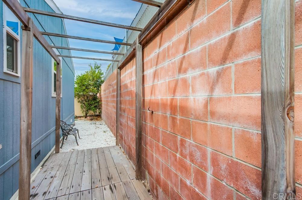 120 Brookside Lane Oceanside, CA 92056 - Photo 52 of 55 a view of a porch with a potted plant