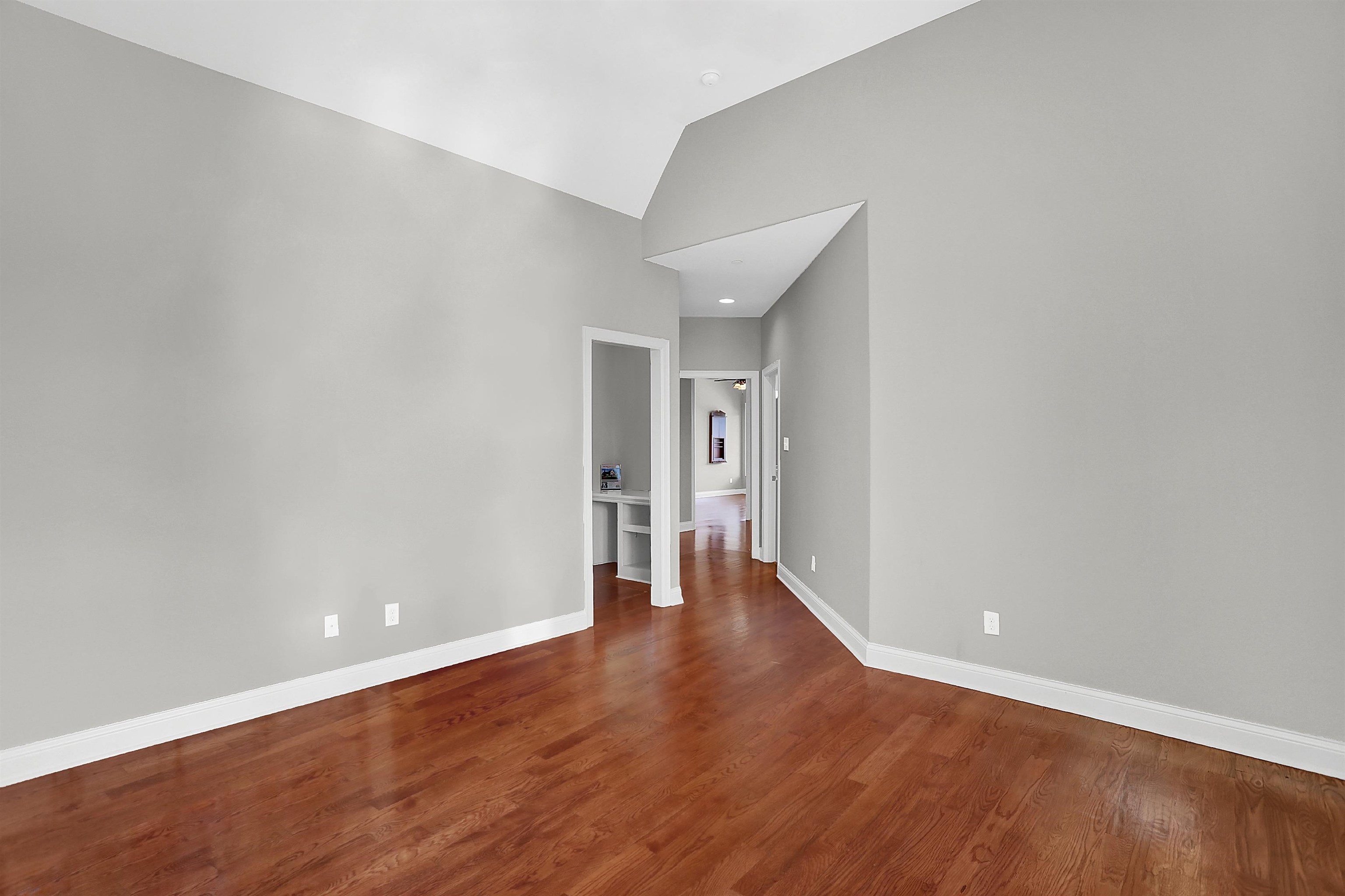105 Parkview Drive Piperton, TN 38017 - Photo 19 of 25 a view of an empty room with wooden floor