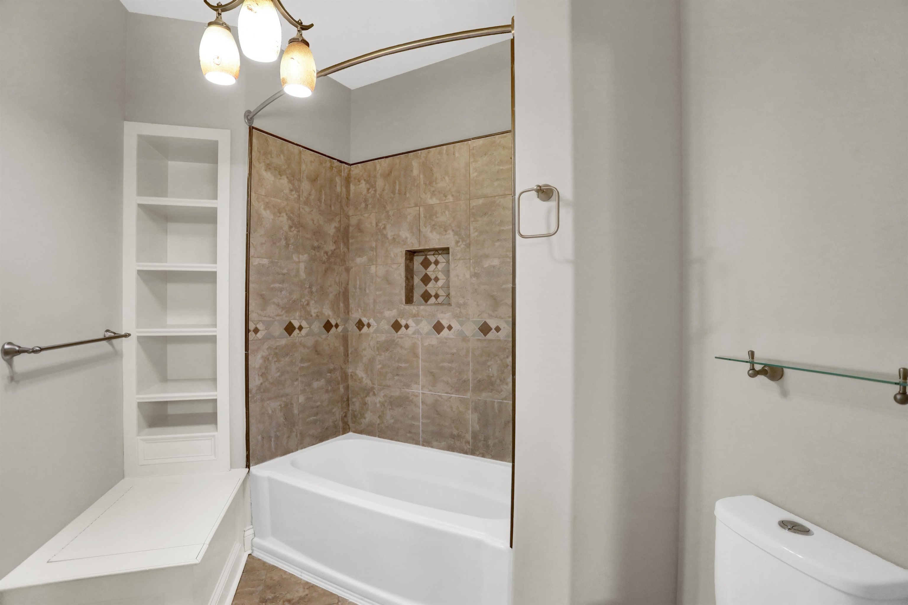 105 Parkview Drive Piperton, TN 38017 - Photo 23 of 25 a bathroom with a bathtub and a shower