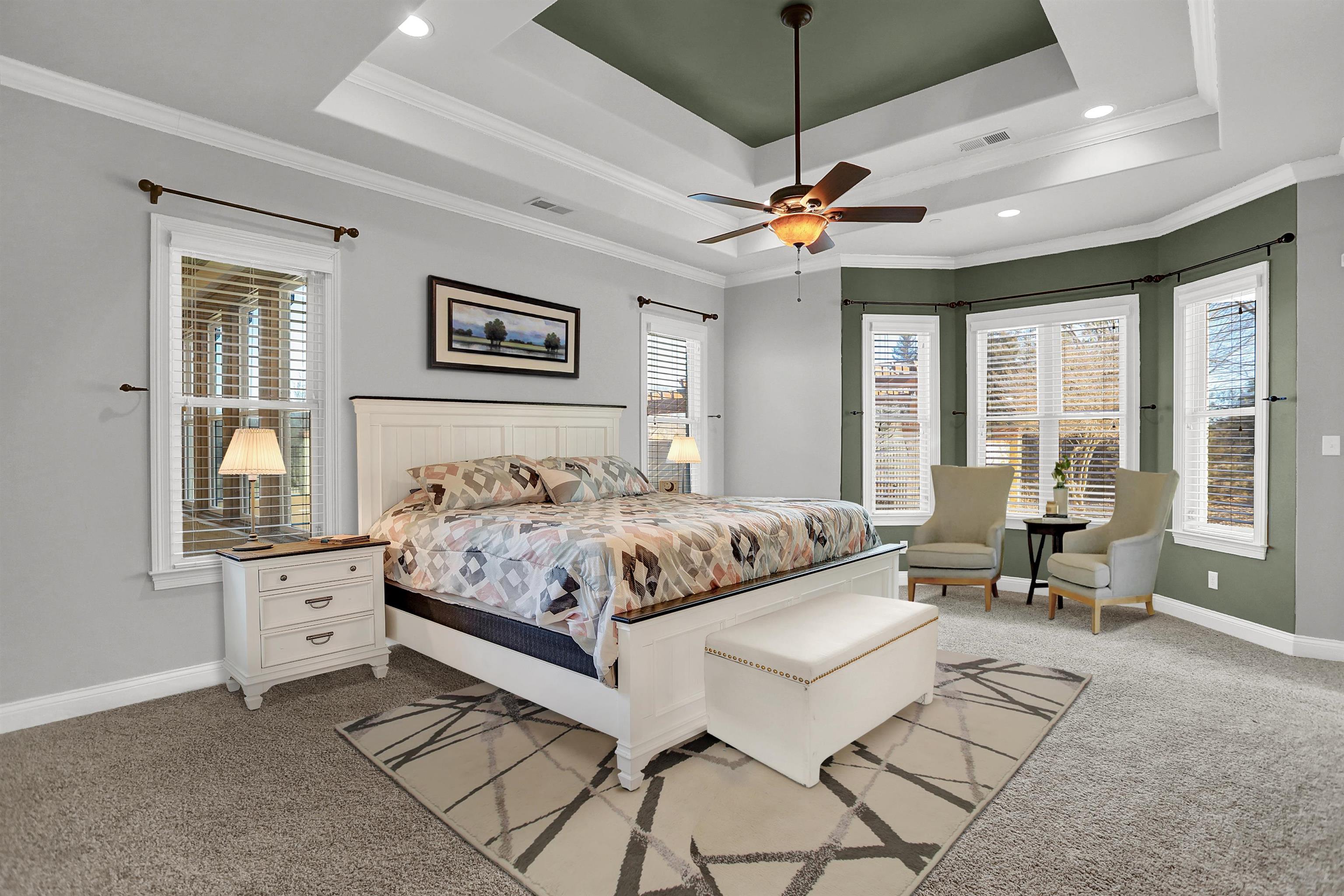 105 Parkview Drive Piperton, TN 38017 - Photo 7 of 25 a bedroom with a bed and a chandelier