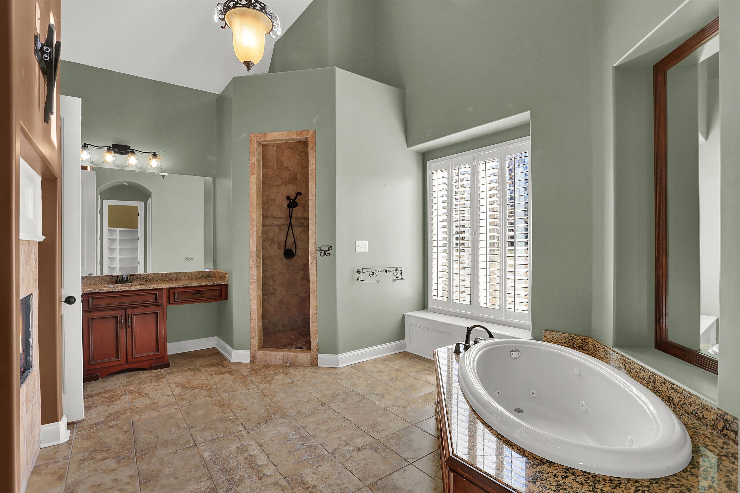 105 Parkview Drive Piperton, TN 38017 - Photo 8 of 25 a spacious bathroom with a tub sink and mirror