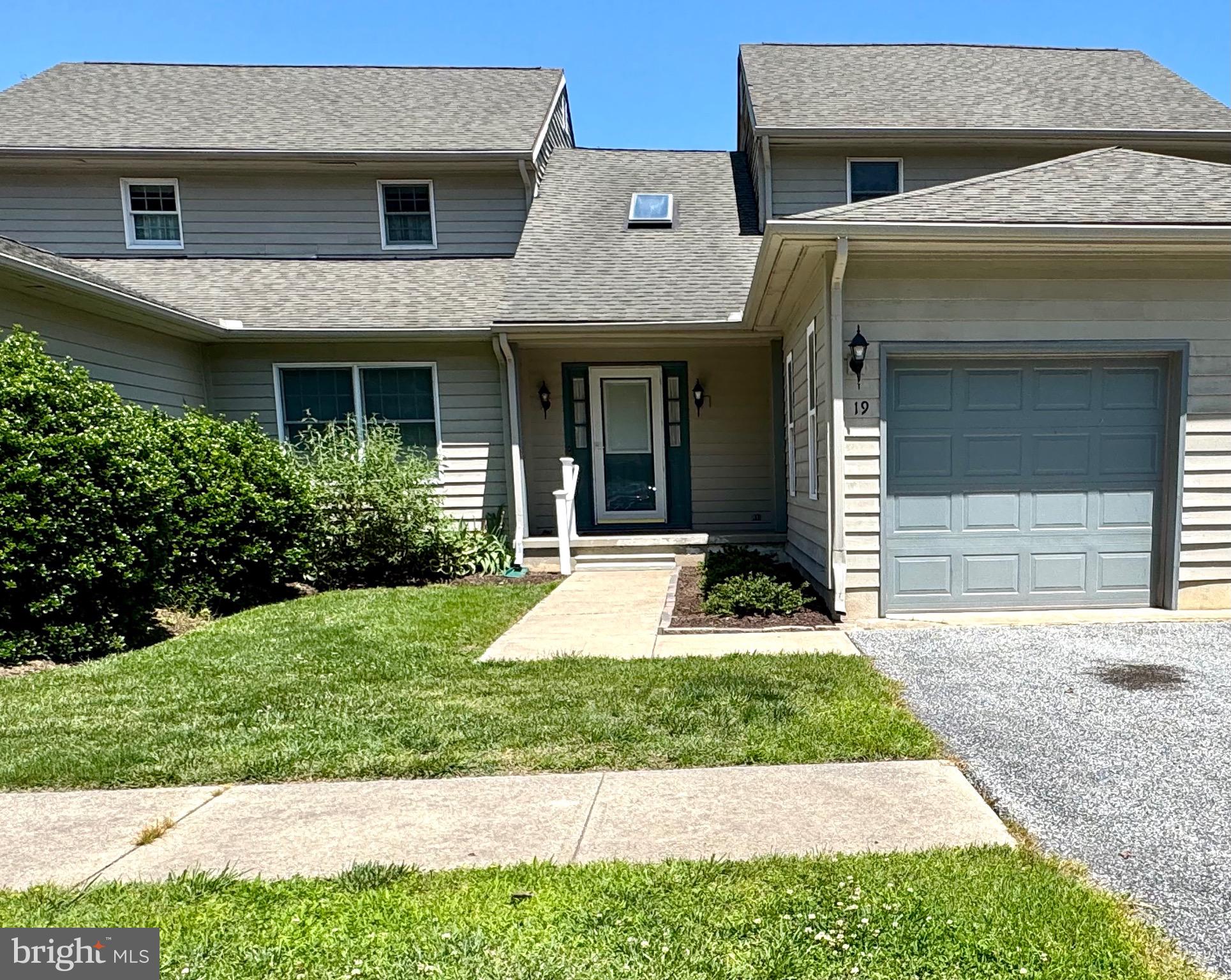 19 Crossgate Drive Seaford, DE 19973 - Photo 2 of 20 a view of a brick house with a yard