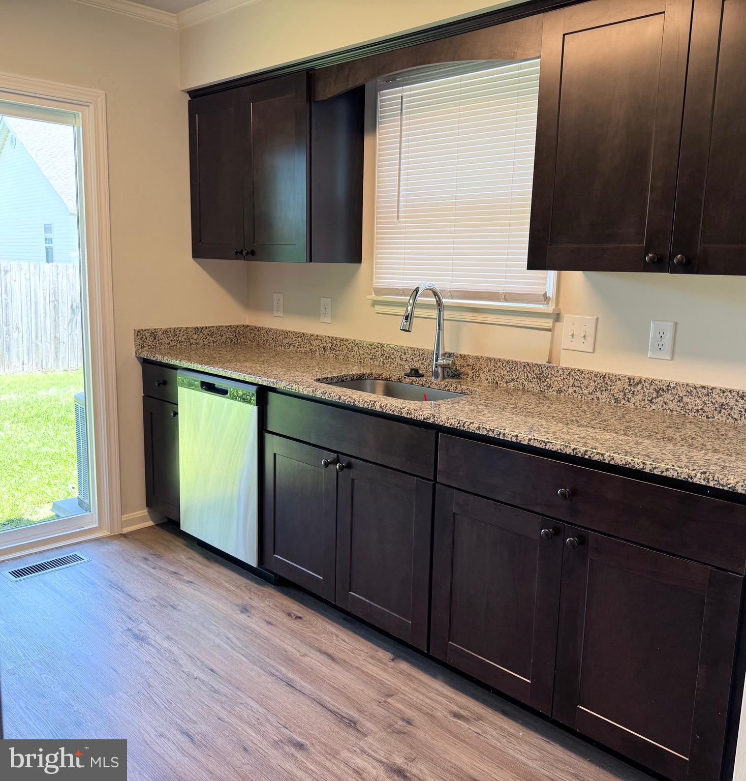 19 Crossgate Drive Seaford, DE 19973 - Photo 5 of 20 a bathroom with a sink and a mirror