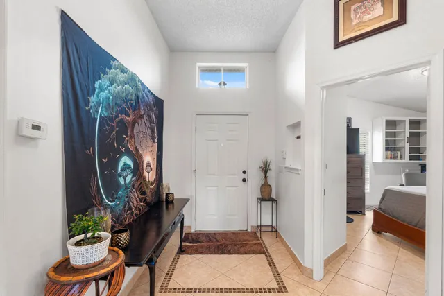 a view of a hallway with furniture and a interior