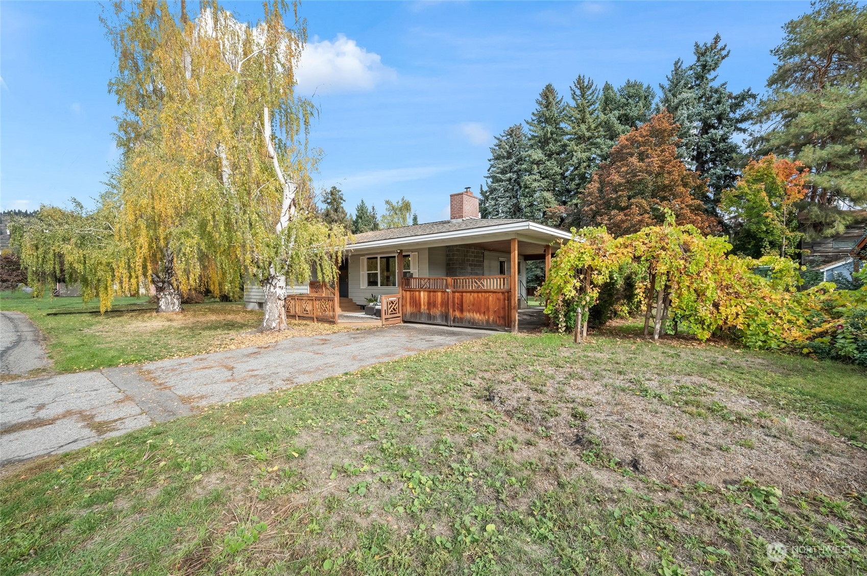 8251 Riverview Road Peshastin, WA 98847 - Photo 11 of 19 a view of a house with a yard