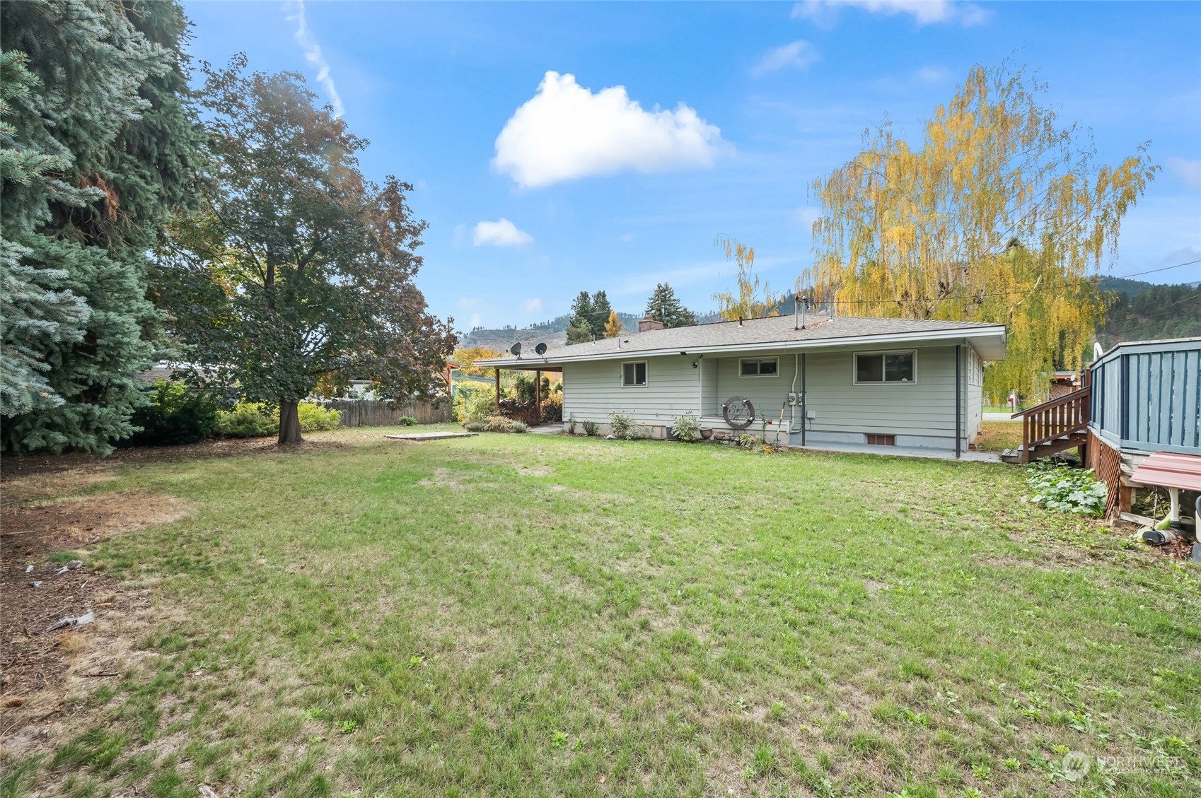 8251 Riverview Road Peshastin, WA 98847 - Photo 14 of 19 a aerial view of a house with a yard