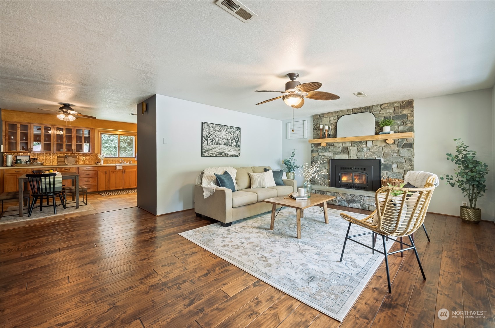 8251 Riverview Road Peshastin, WA 98847 - Photo 19 of 19 a living room with furniture and a fireplace