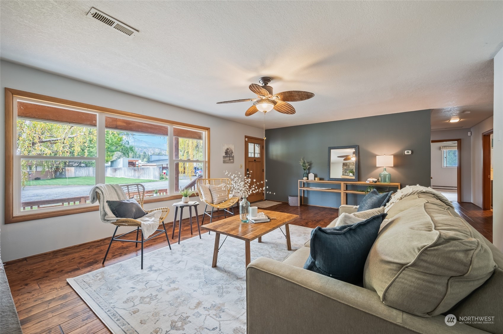 8251 Riverview Road Peshastin, WA 98847 - Photo 3 of 19 a living room with furniture and a window