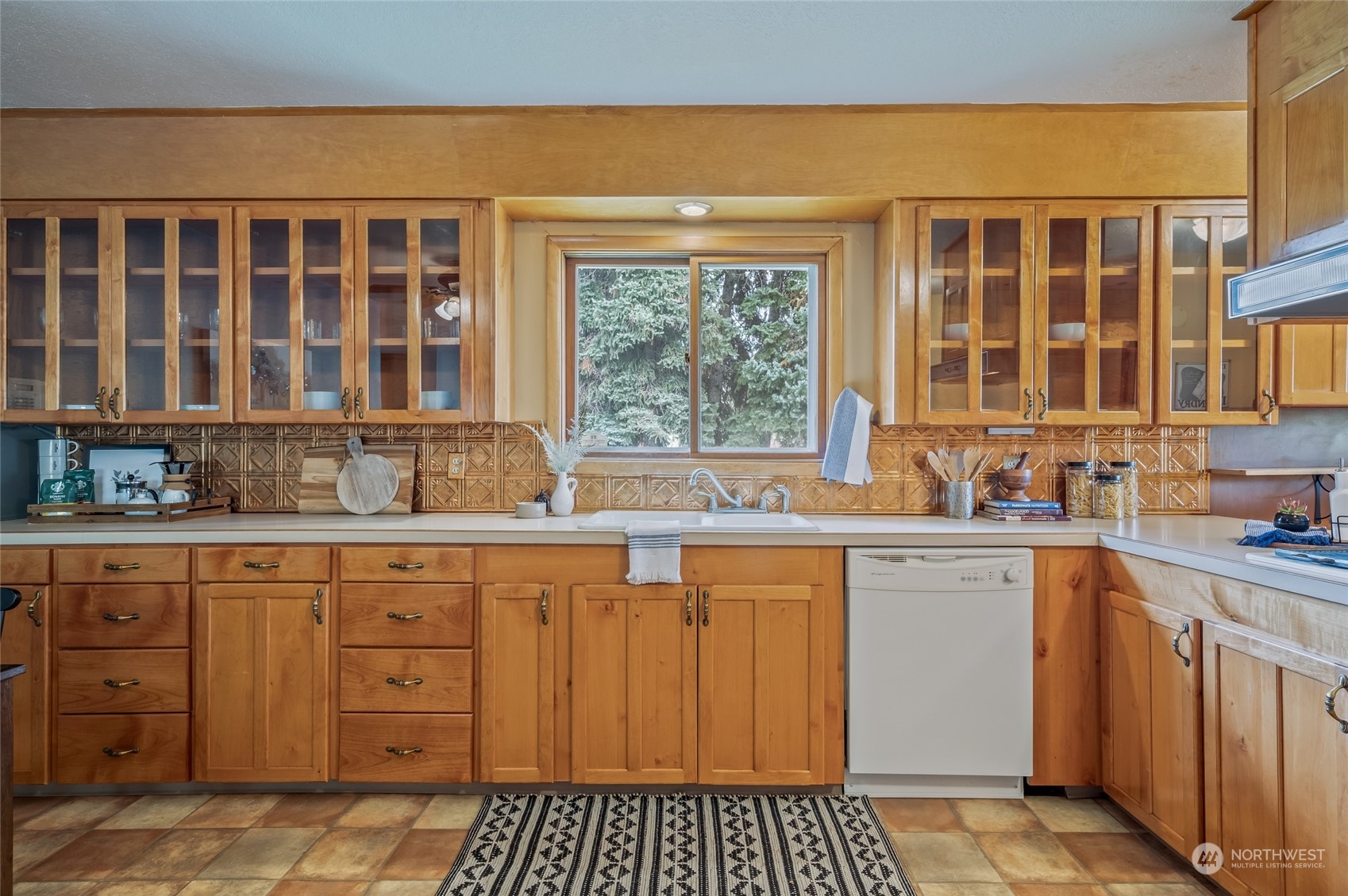 8251 Riverview Road Peshastin, WA 98847 - Photo 4 of 19 a kitchen with a sink stove and cabinets