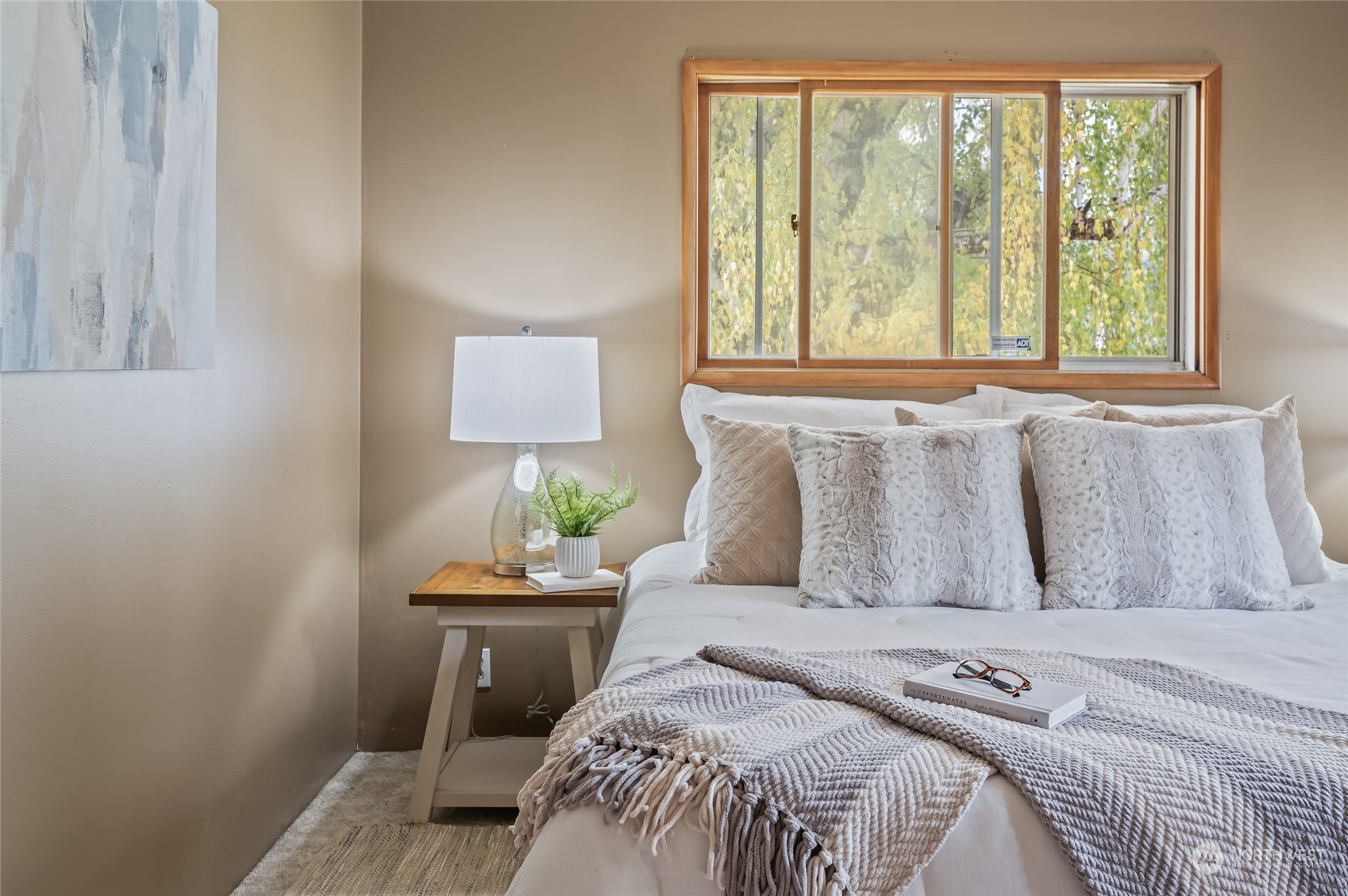 8251 Riverview Road Peshastin, WA 98847 - Photo 6 of 19 a bedroom with a bed and a window