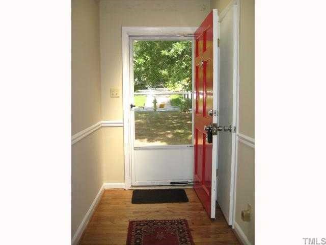 3819 Corwin Road Garner, NC 27529 - Photo 2 of 12 Nice foyer with skylight & hardwoods
