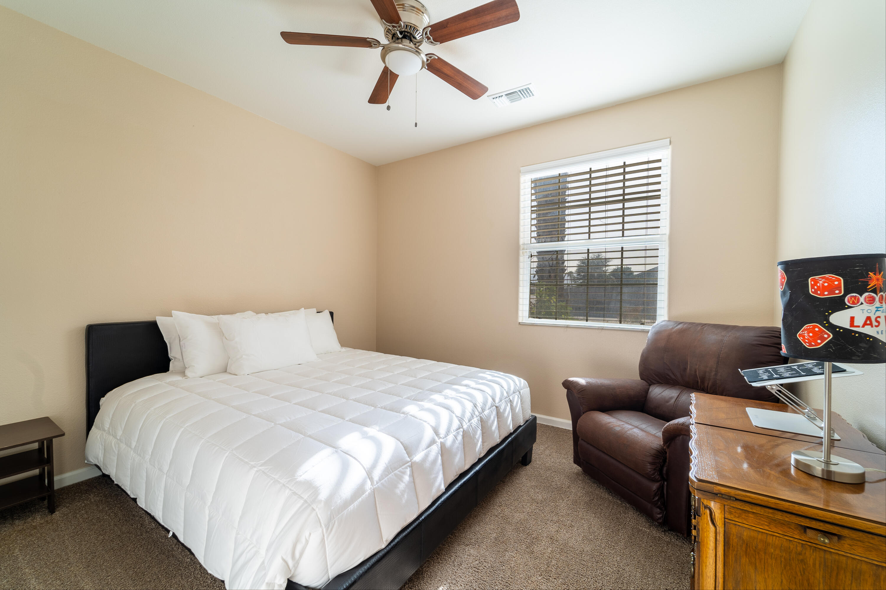 47970 Austin Drive Indio, CA 92201 - Photo 14 of 32 a bedroom with a bed and a couch