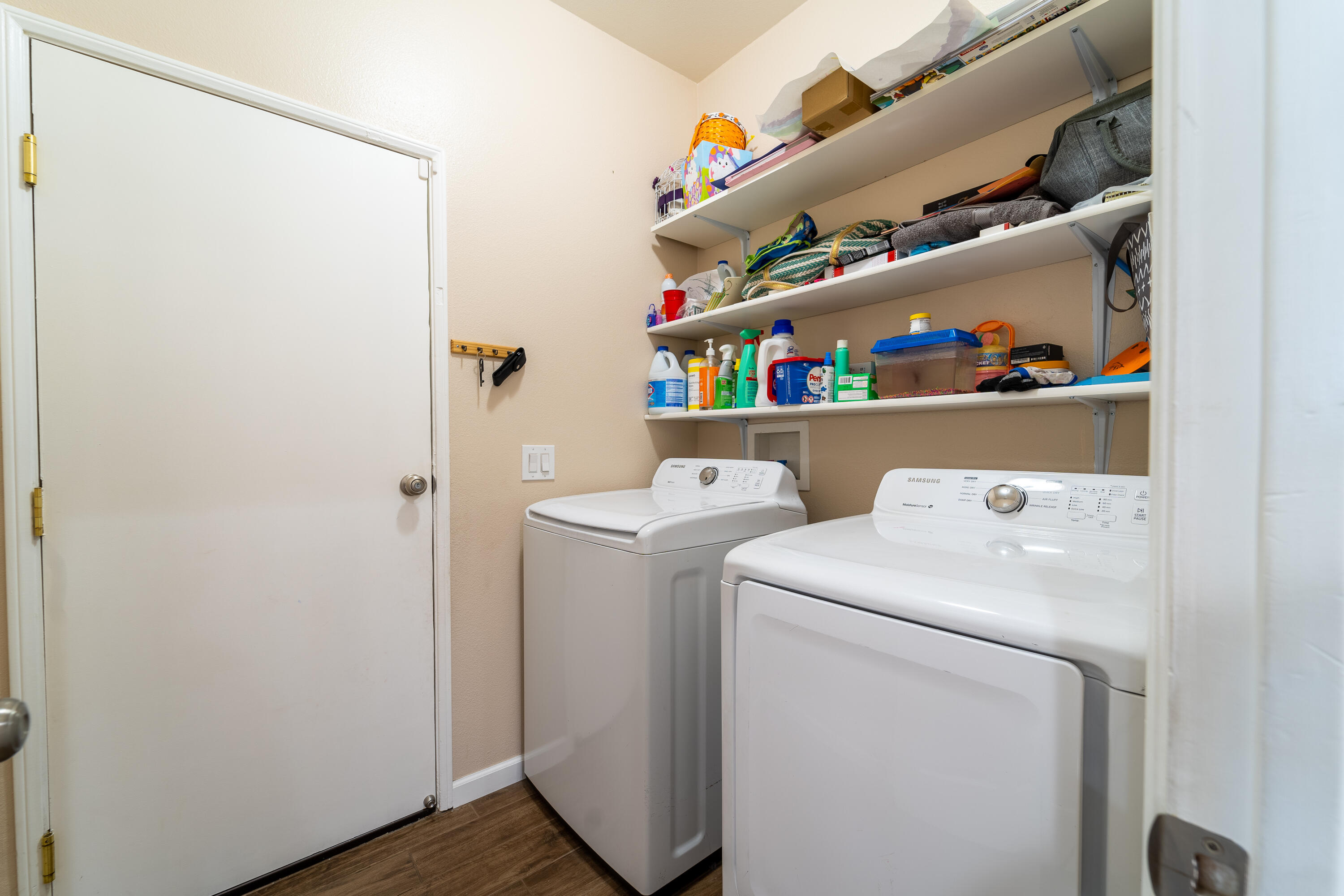 47970 Austin Drive Indio, CA 92201 - Photo 16 of 32 a utility room with dryer and washer