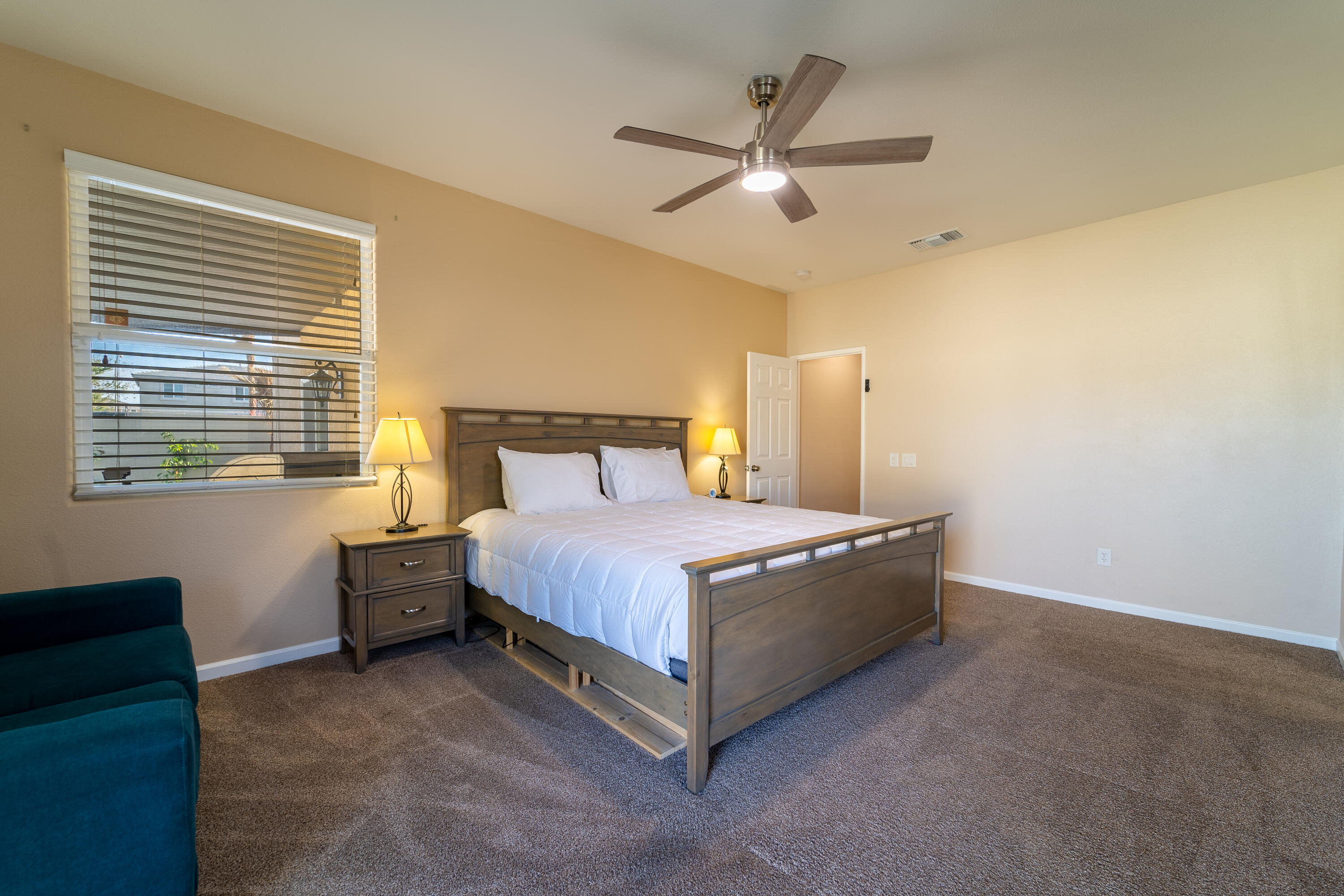 47970 Austin Drive Indio, CA 92201 - Photo 21 of 32 a bedroom with a bed and a window