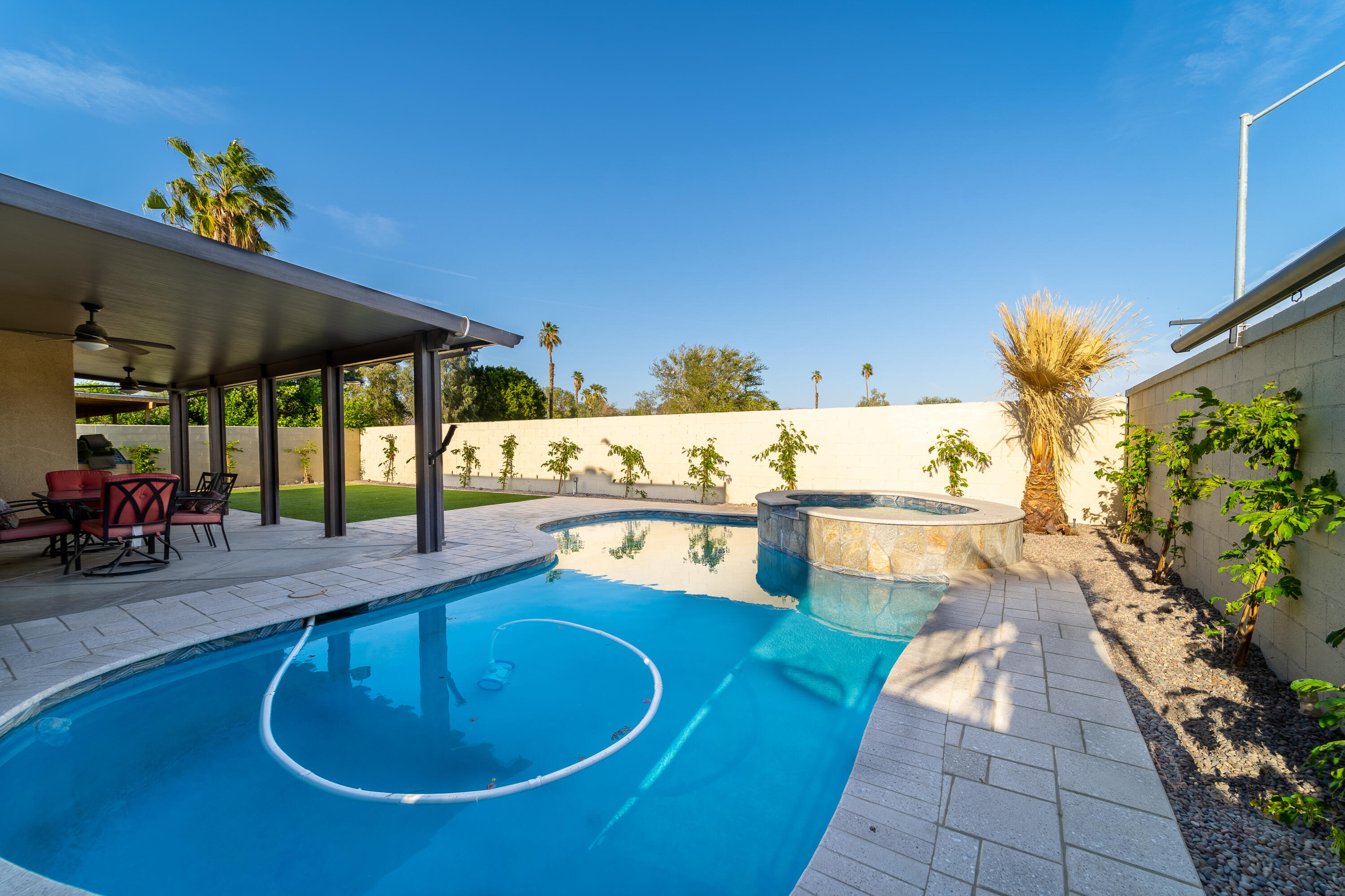 47970 Austin Drive Indio, CA 92201 - Photo 28 of 32 a swimming pool view with a seating space