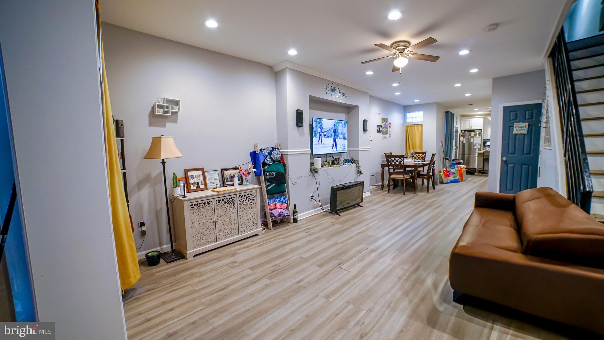 5635 North 10th Street Philadelphia, PA 19141 - Photo 2 of 13 a living room with furniture and wooden floors
