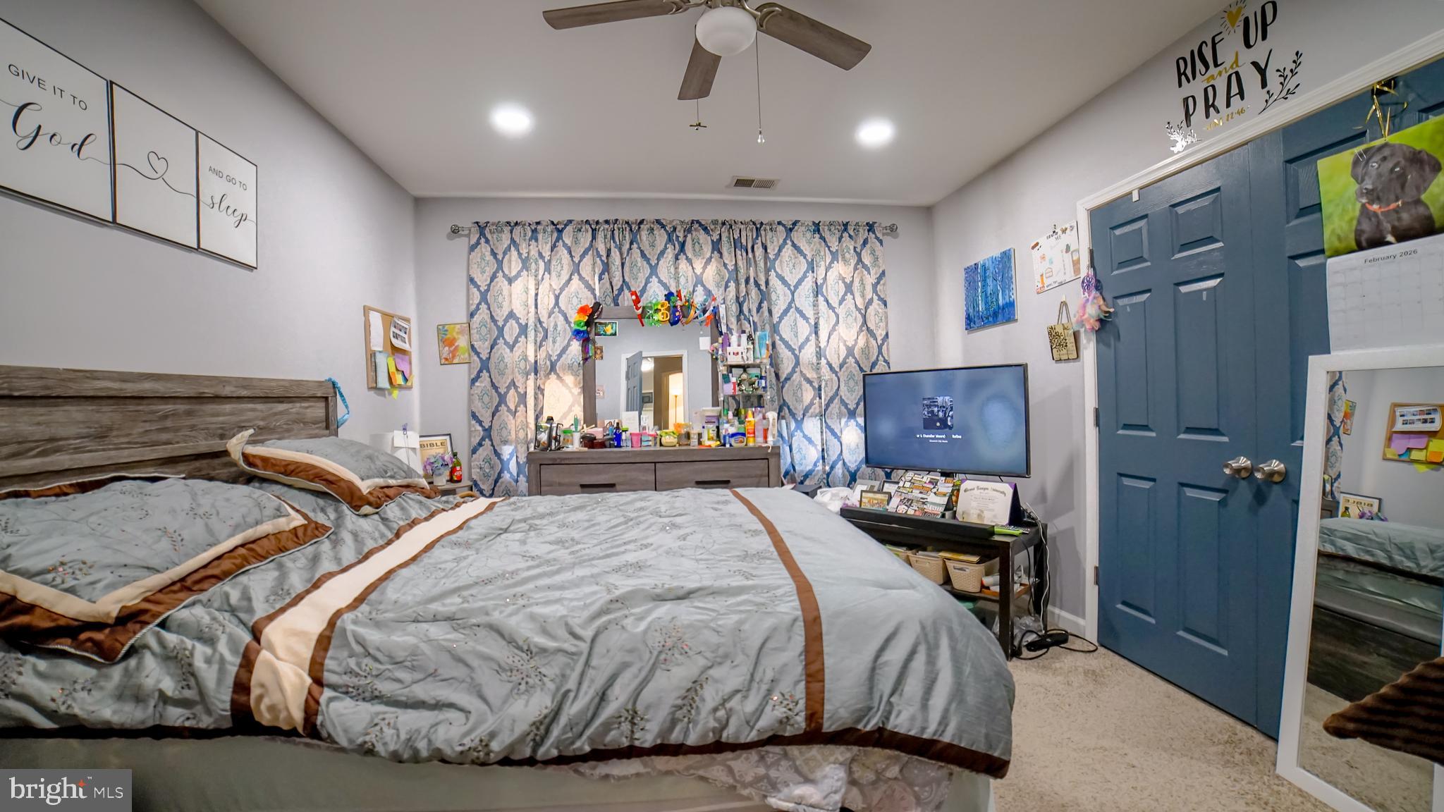 5635 North 10th Street Philadelphia, PA 19141 - Photo 6 of 13 a bedroom with a bed and wooden floor