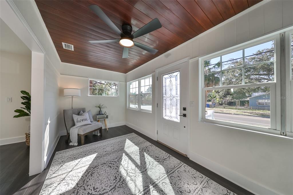 1846 3rd Street South St. Petersburg, FL 33705 - Photo 9 of 40 a bed room with a bed and a large window