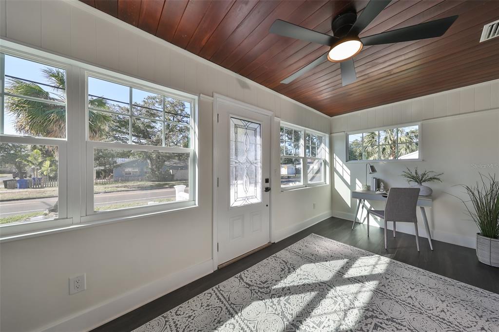 1846 3rd Street South St. Petersburg, FL 33705 - Photo 10 of 40 a living room with furniture and a large window