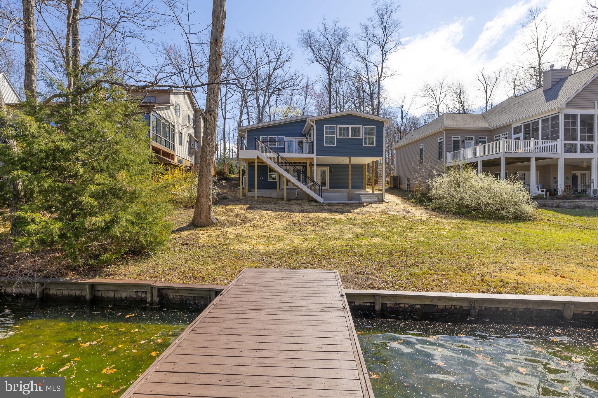 116 Washington Street Locust Grove, VA 22508 - Photo 129 of 130 a front view of a house with a yard