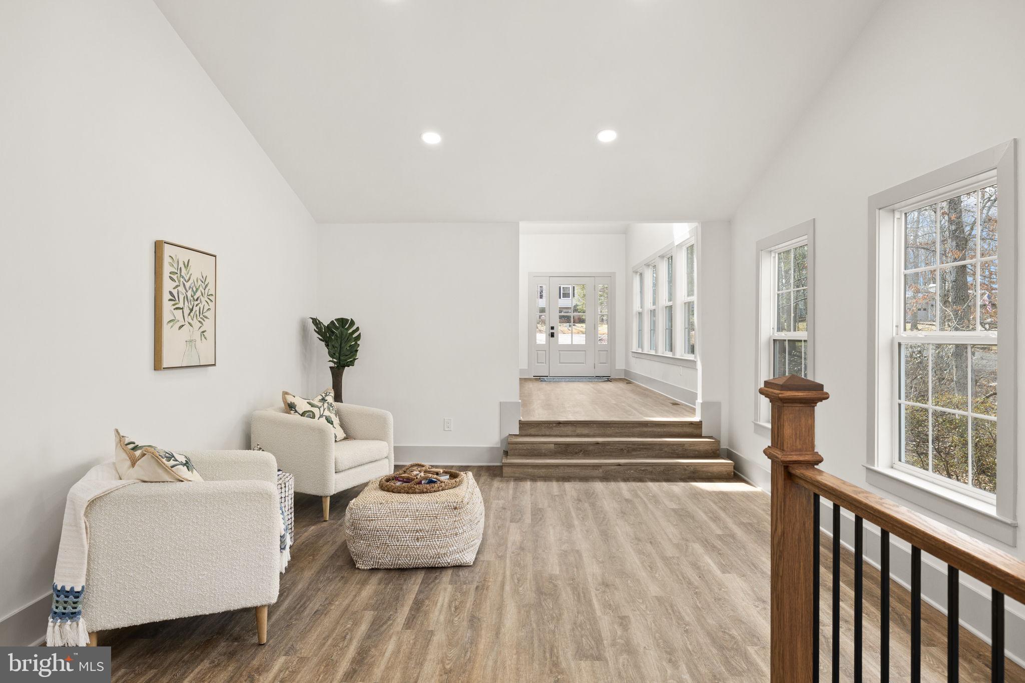 116 Washington Street Locust Grove, VA 22508 - Photo 20 of 130 a living room with furniture and a table