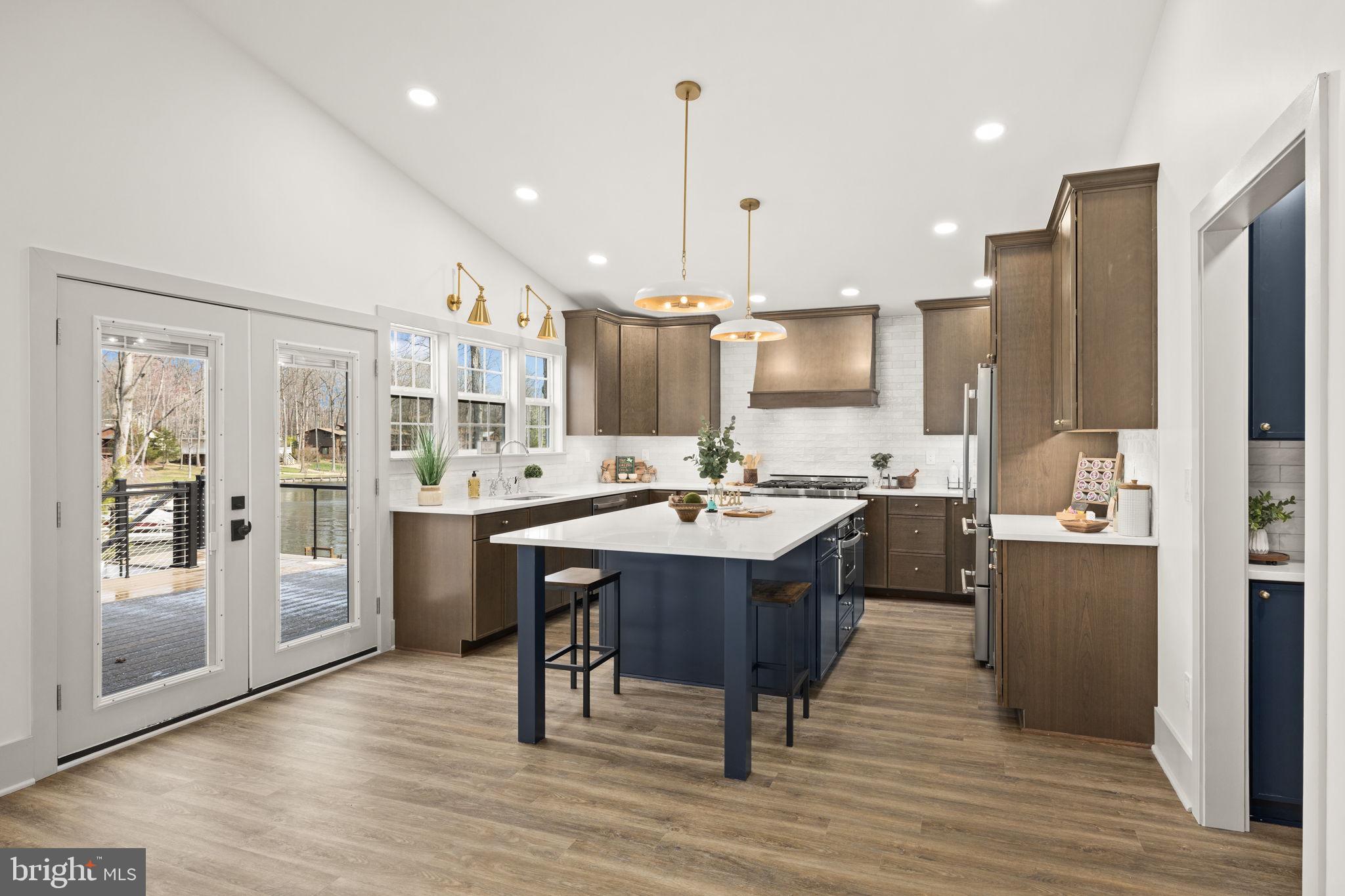 116 Washington Street Locust Grove, VA 22508 - Photo 26 of 130 a large kitchen with a table and chairs
