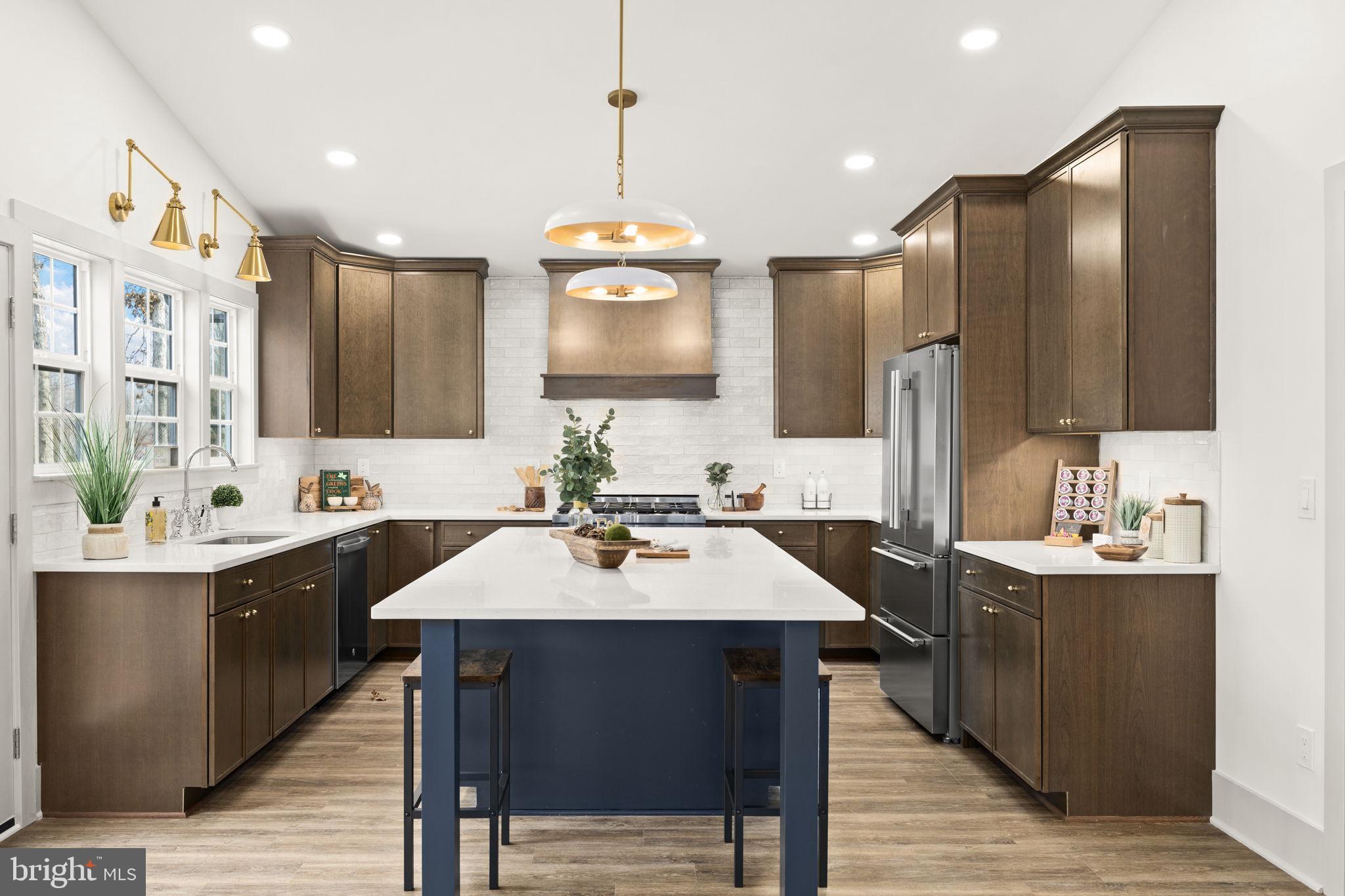 116 Washington Street Locust Grove, VA 22508 - Photo 28 of 130 a kitchen with a sink cabinets and wooden floor