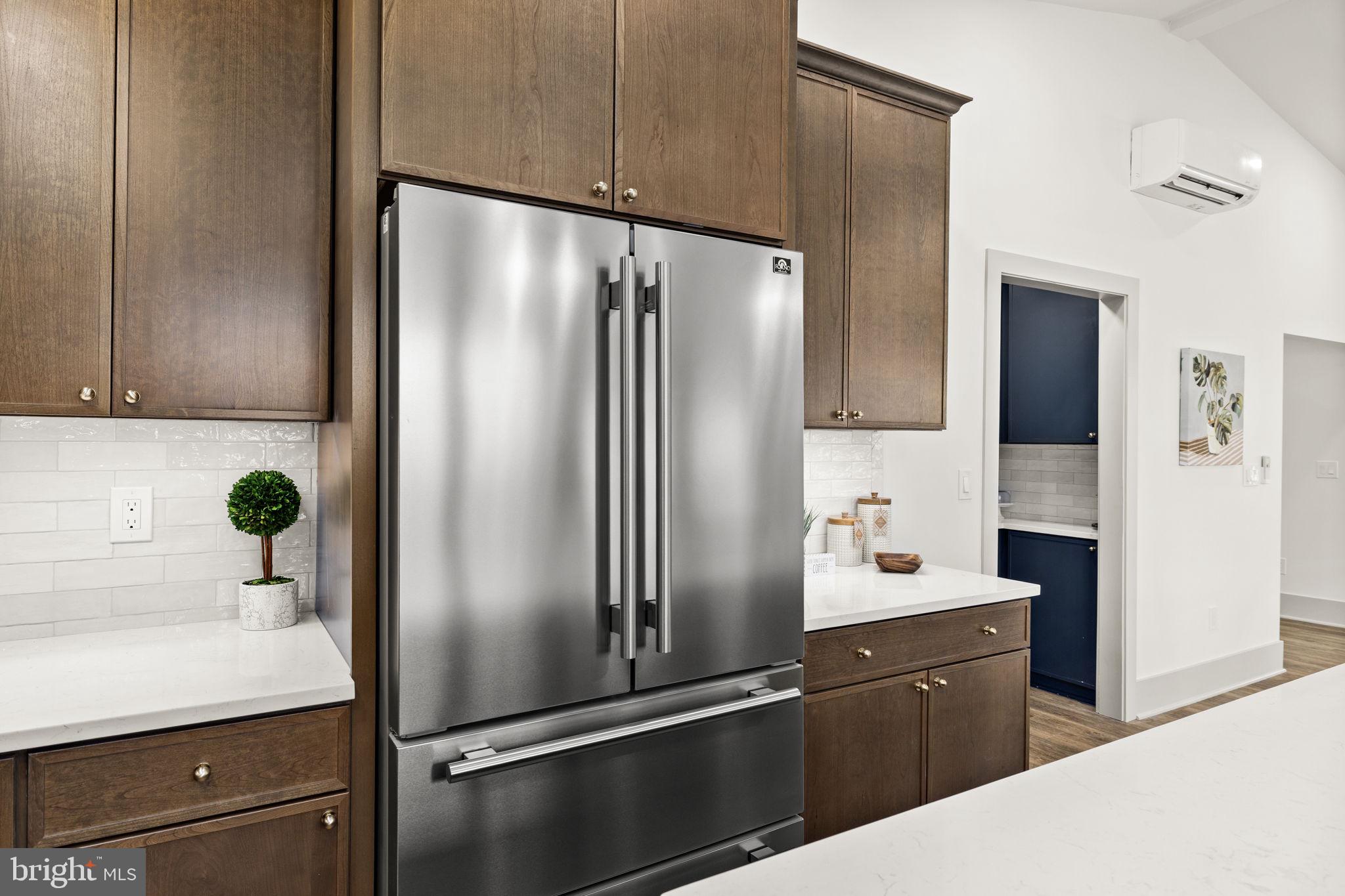 116 Washington Street Locust Grove, VA 22508 - Photo 34 of 130 a kitchen with stainless steel appliances a refrigerator and sink