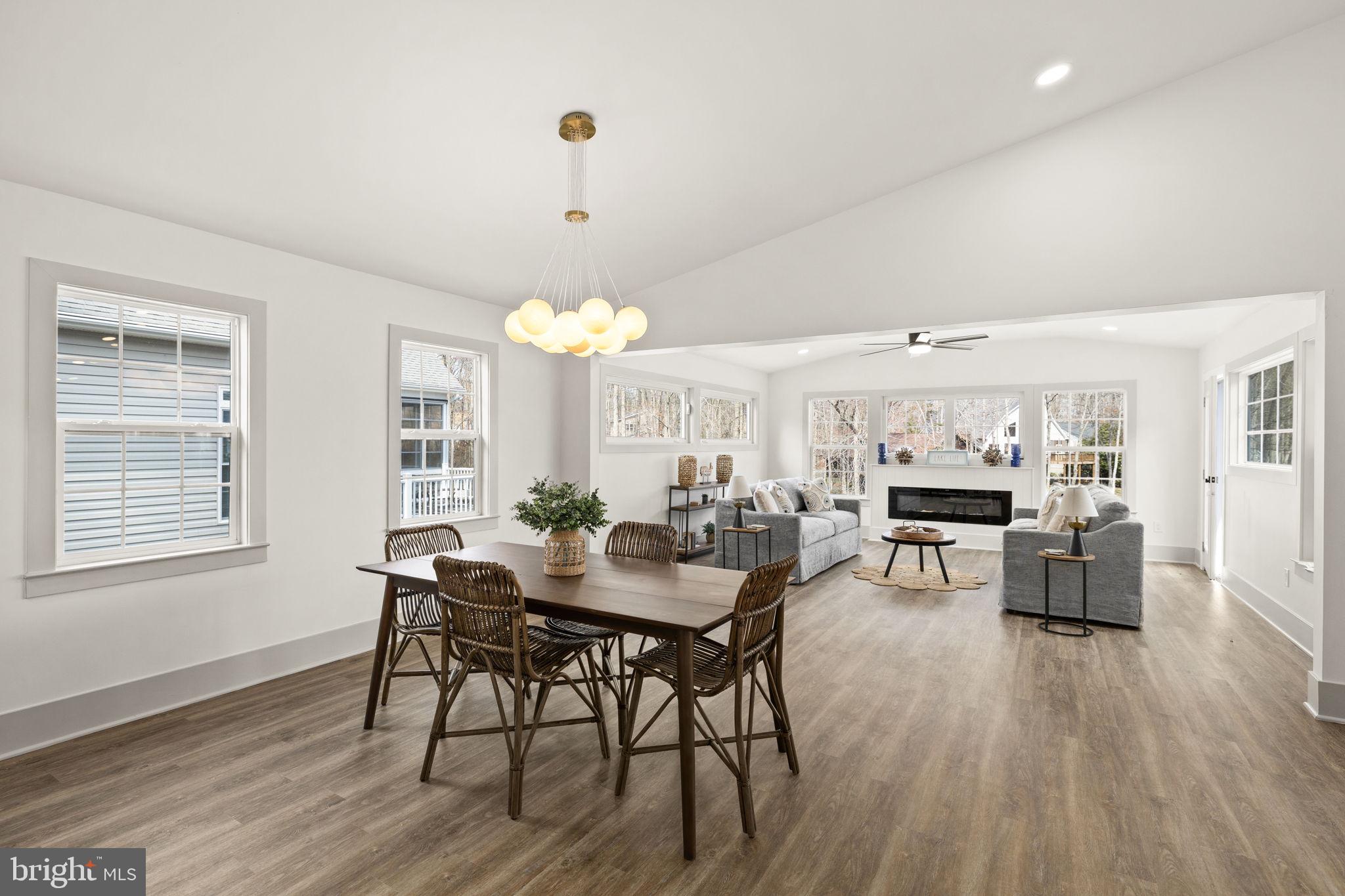 116 Washington Street Locust Grove, VA 22508 - Photo 36 of 130 a view of a dining room with furniture window and wooden floor