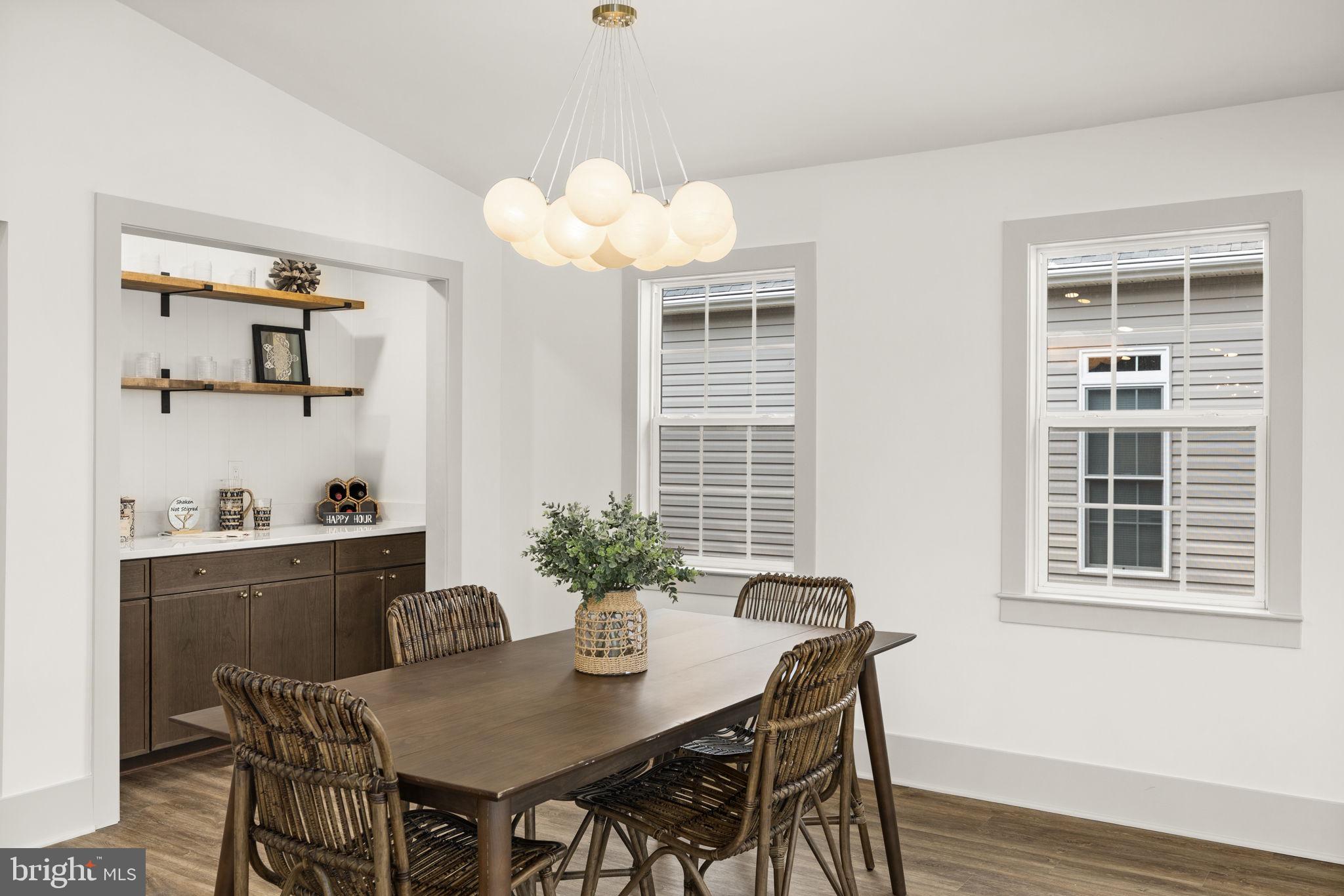 116 Washington Street Locust Grove, VA 22508 - Photo 37 of 130 a view of a dining room with furniture window and wooden floor