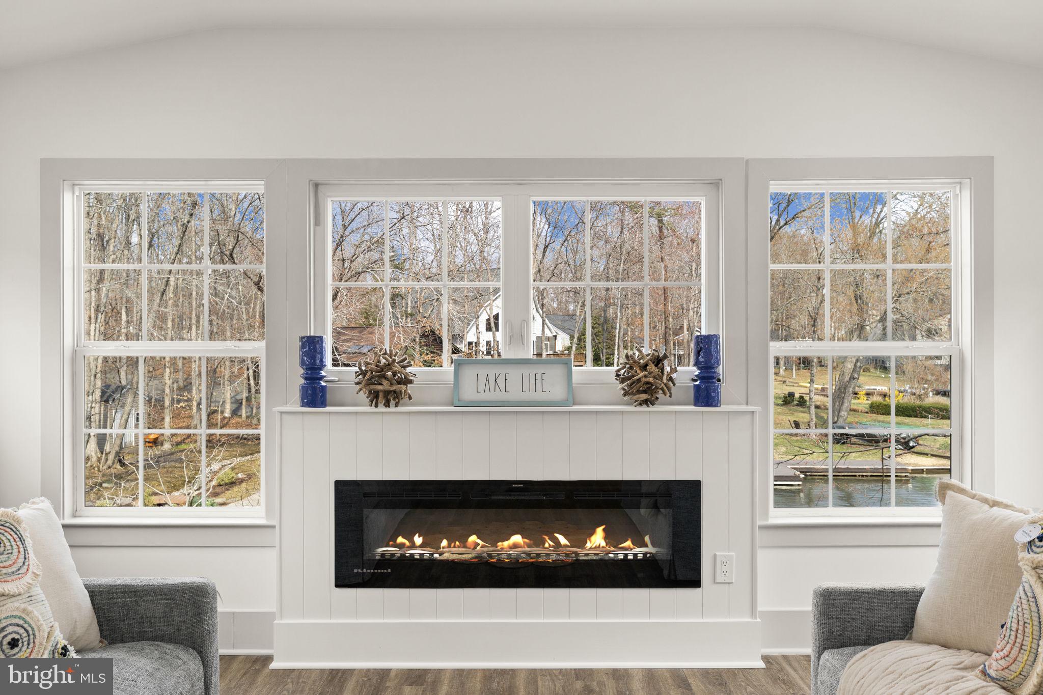 116 Washington Street Locust Grove, VA 22508 - Photo 47 of 130 a living room with furniture and a fireplace
