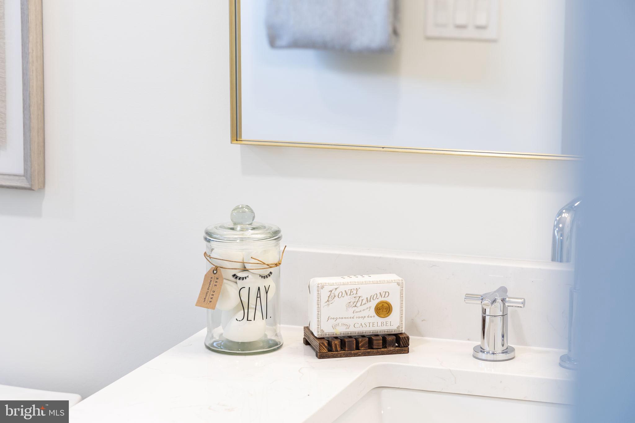116 Washington Street Locust Grove, VA 22508 - Photo 64 of 130 a kitchen with a sink and a stove with wooden floor