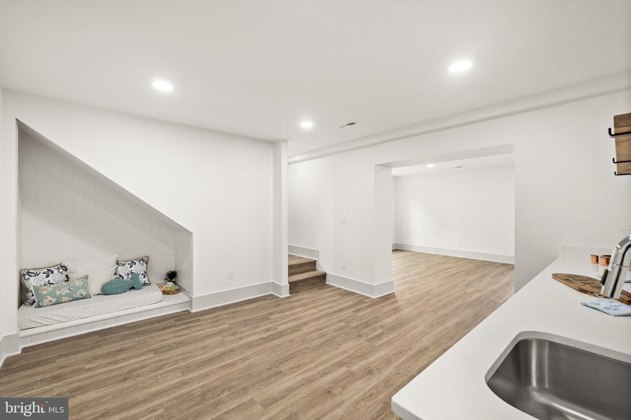 116 Washington Street Locust Grove, VA 22508 - Photo 68 of 130 a view of a kitchen with a sink and wooden floor