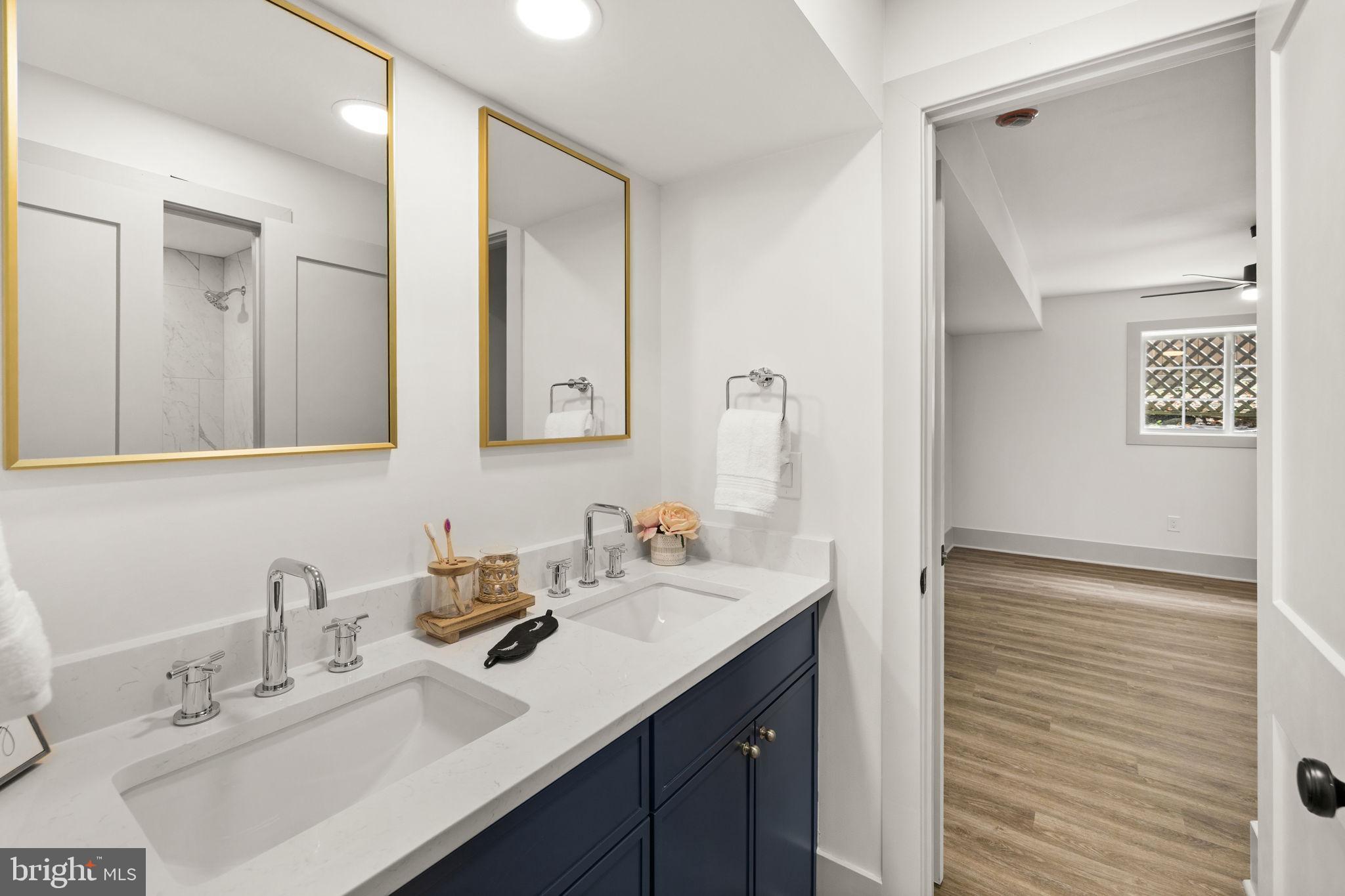 116 Washington Street Locust Grove, VA 22508 - Photo 76 of 130 a bathroom with a sink vanity and mirror