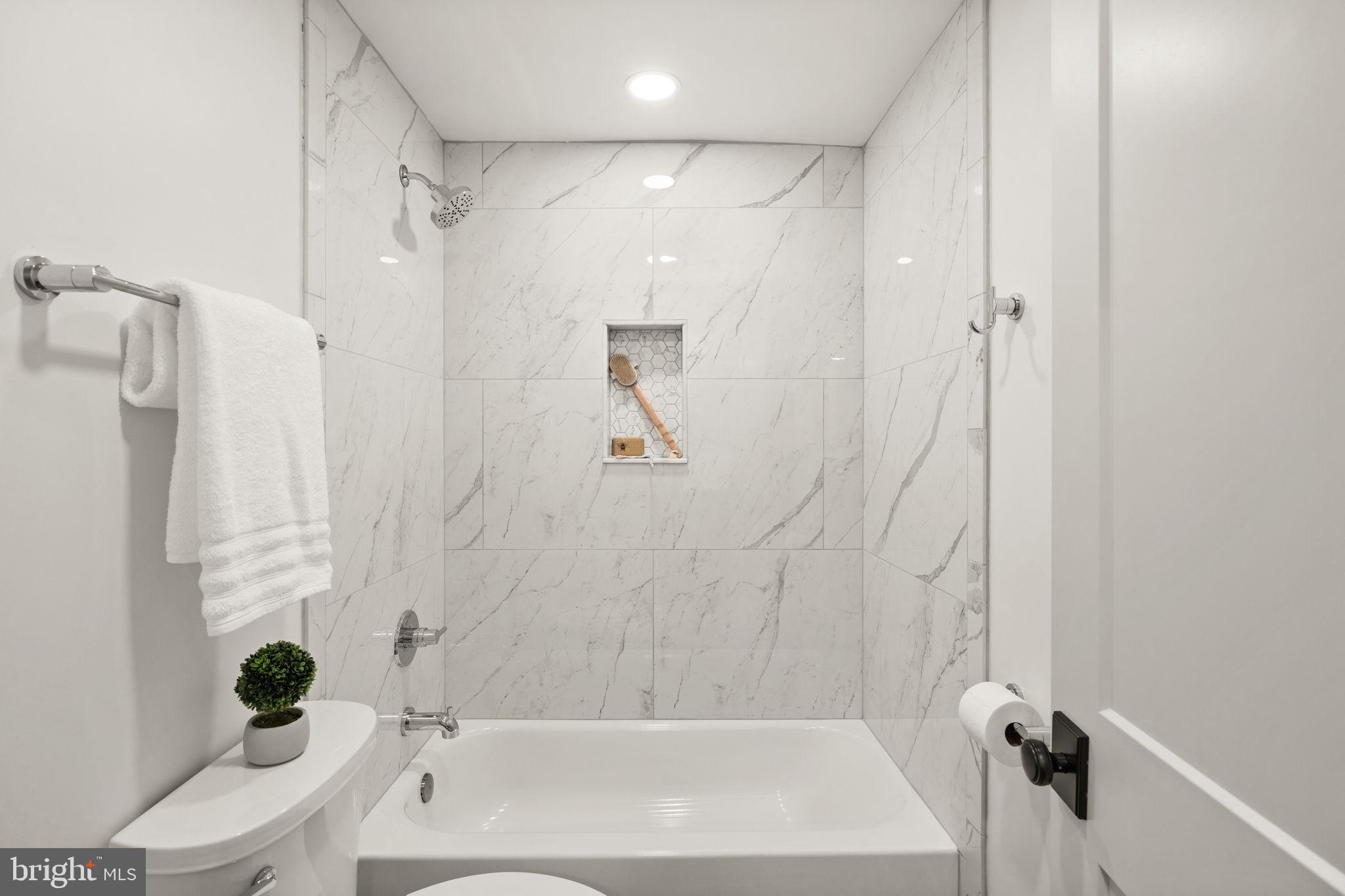 116 Washington Street Locust Grove, VA 22508 - Photo 78 of 130 a bathroom with a bathtub and a shower