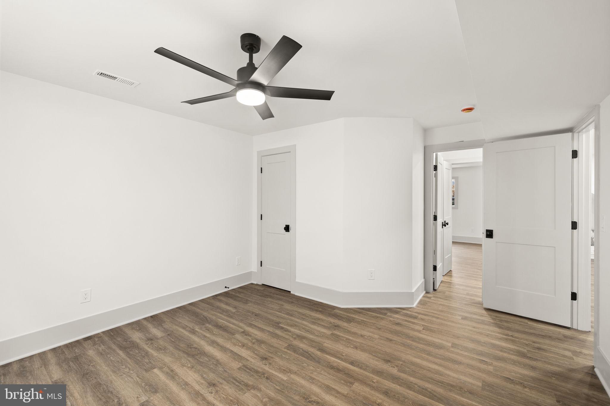 116 Washington Street Locust Grove, VA 22508 - Photo 80 of 130 a view of empty room with wooden floor