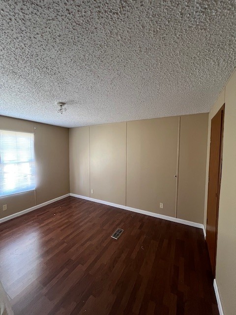 437 Halltown Road Portland, TN 37148 - Photo 13 of 14 an empty room with wooden floor and windows