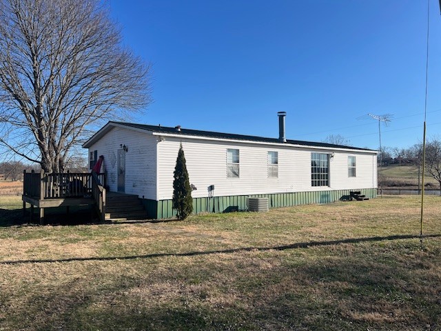 437 Halltown Road Portland, TN 37148 - Photo 14 of 14 a view of a house with a yard