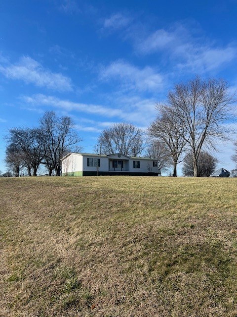 437 Halltown Road Portland, TN 37148 - Photo 2 of 14 a view of large yard with trees