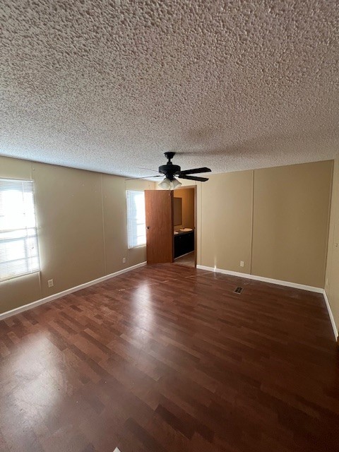 437 Halltown Road Portland, TN 37148 - Photo 3 of 14 an empty room with wooden floor and windows