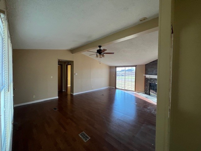 437 Halltown Road Portland, TN 37148 - Photo 7 of 14 an empty room with wooden floor chandelier and windows